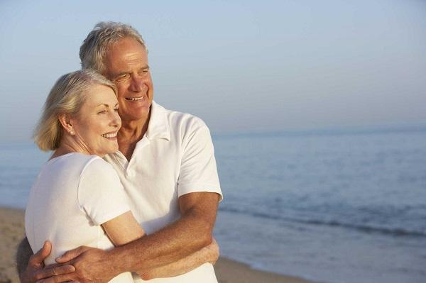 Couple hugging on the beach