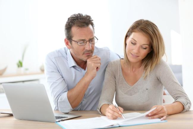 Couple reviewing paperwork