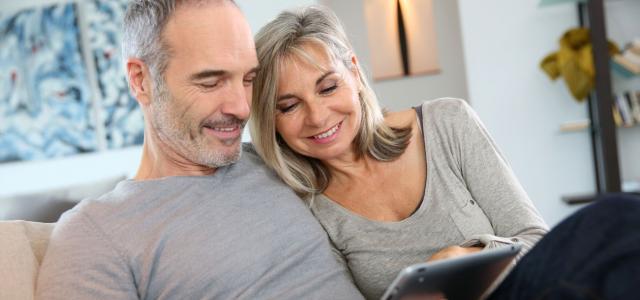 Couple looking at tablet